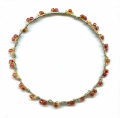 Wire wrapped sterling silver bracelet - rose lined amber beads