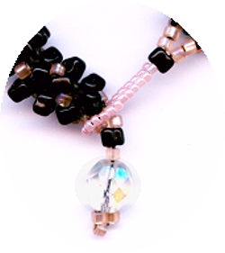 close-up of the focal bead for necklace Dark nebula