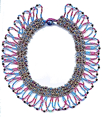 tubular netting beadwork necklace with overlapping loop fringe featuring firepolished faceted beads.