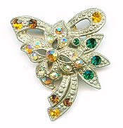 Early 20th century pot metal dress clip with brilliant multi-colored rhinestones.